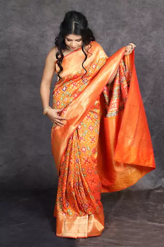 Orange patola print banarasi saree