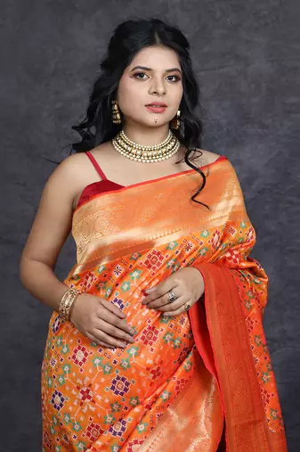 Orange patola print banarasi saree
