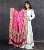 Ivory banarasi anarkali set with pink bandhani dupatta