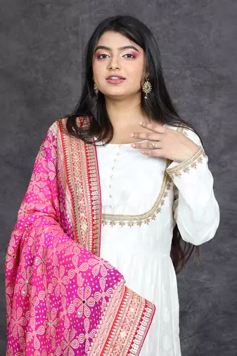 Ivory banarasi anarkali set with pink bandhani dupatta