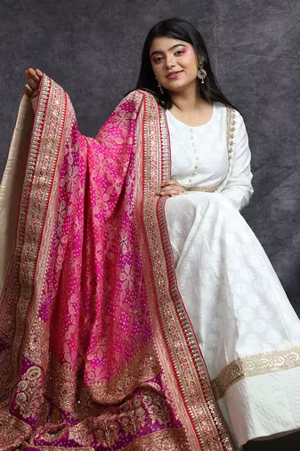 Ivory banarasi anarkali set with pink bandhani dupatta