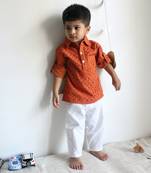 Schiffli rust orange kurta set