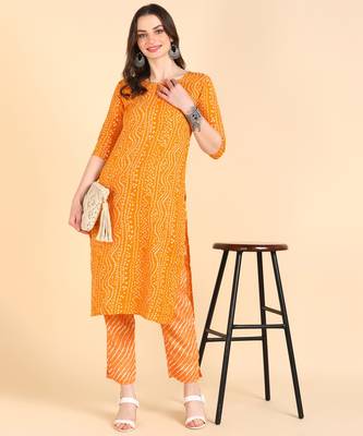 Women's Yellow Printed Cotton Kurti With Pant Set 1
