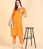 Women's Yellow Printed Cotton Kurti With Pant Set