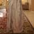Kimisha women's beige silk woven saree with unstitched blouse piece