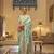 Kimisha women's turquoise woven saree with unstitched blouse piece