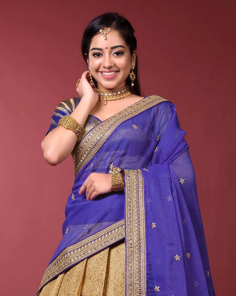 Celebrate Fashion with Chiku and Violet Banarasi Silk Pavadai Davani