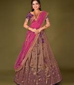 Wine colour Banarasi Silk Zari Work Lehenga With dupatta and unstitched blouse.