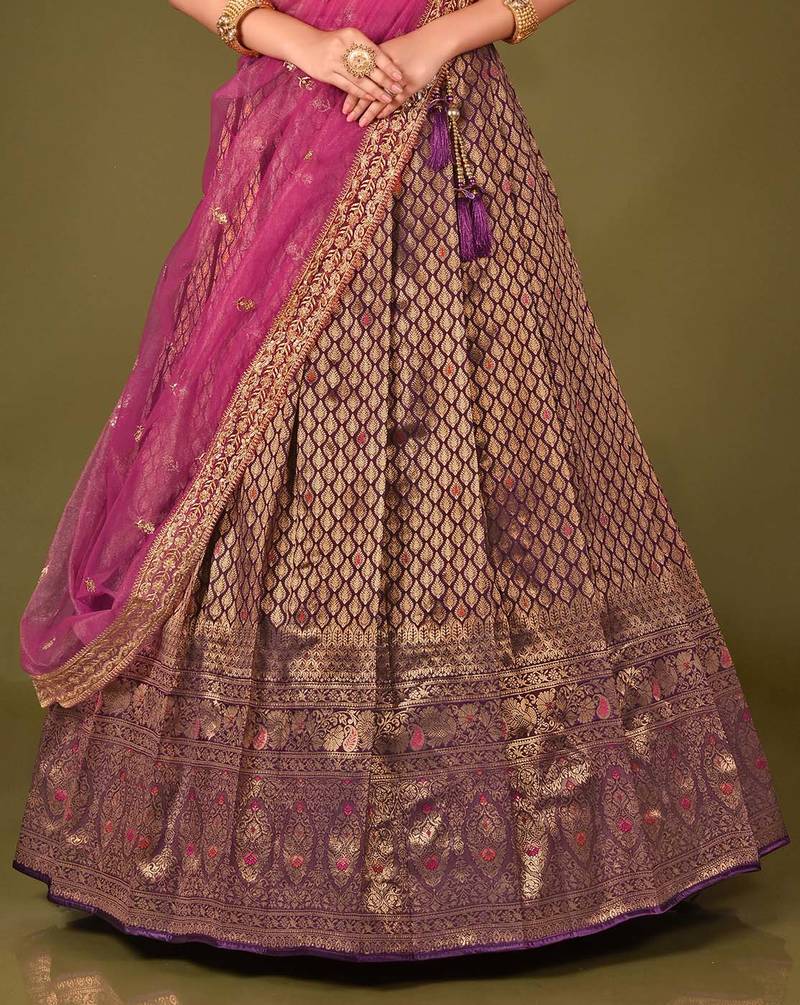 Wine colour Banarasi Silk Zari Work Lehenga With dupatta and unstitched blouse.