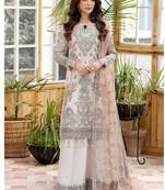 White Semi Stitched Heavy Pakistani Embroidery worked suite in Butterfly net 
