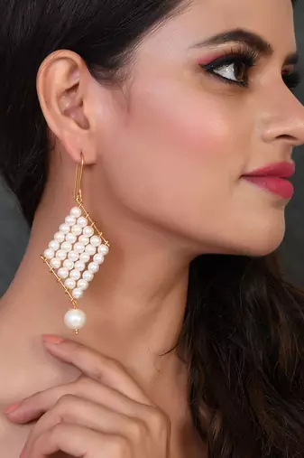 Gold tone pearl dangle western earrings