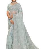 Sea green resham embroidered organza saree with blouse