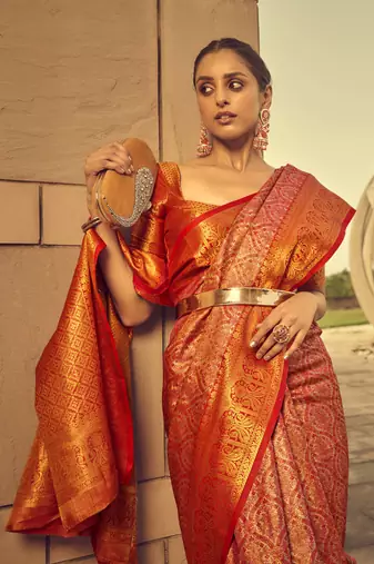 red heavy brocade faux silk blend woven with jacquard work saree with blouse