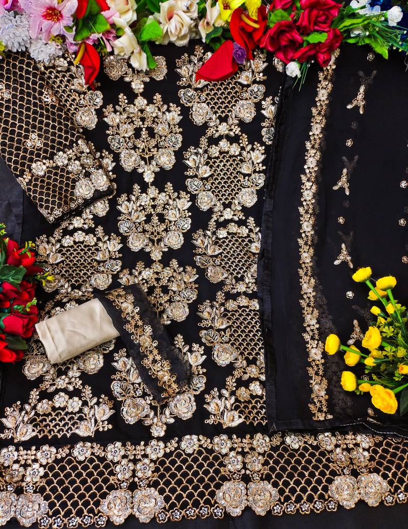 Black semi stitched Pakistani suite with heavy embroidery and diamond work inn Georgette fabric