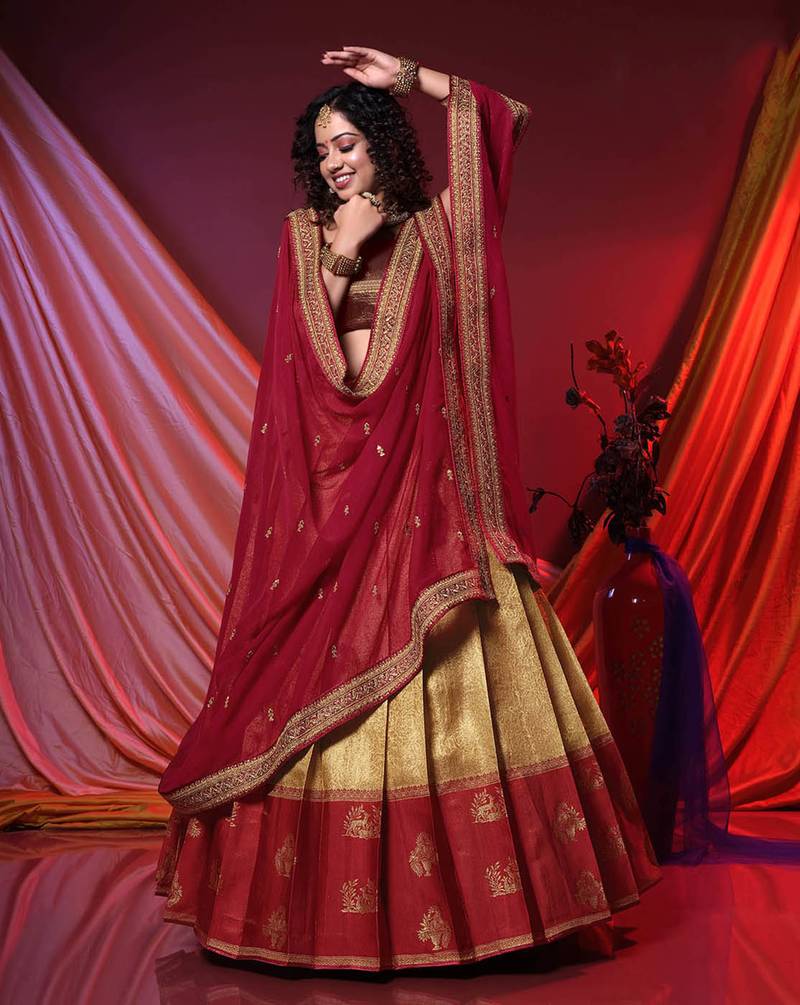 Pleating Style Chiku and Maroon Banarasi Silk semi-stitched Half Saree with unstitched Blouse and Dupatta