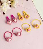 Set of 8 heart tic tac and rubber band hair accessory set