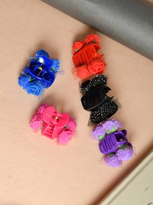 Flower embellished claw clip hair accessory 1