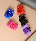 Flower embellished claw clip hair accessory