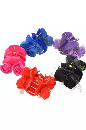 Flower embellished claw clip hair accessory