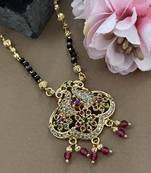 Gold plated fancy short mangalsutra ad & multi stone peacock pendant gold & black beads chain