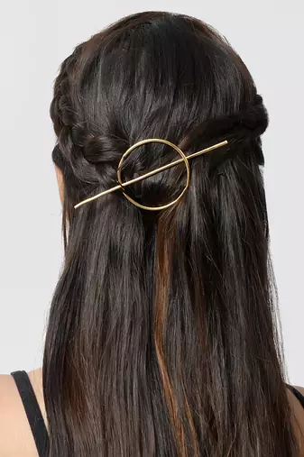 Circular gold plated hair accessory