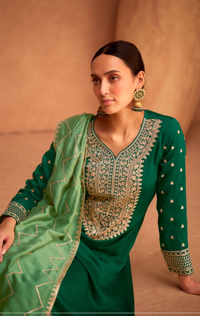Green silk semi stitched suite with embroidery work 
