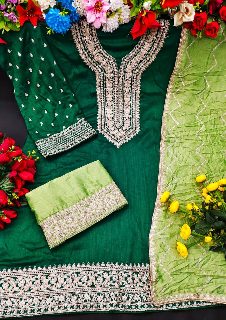 Green silk semi stitched suite with embroidery work 