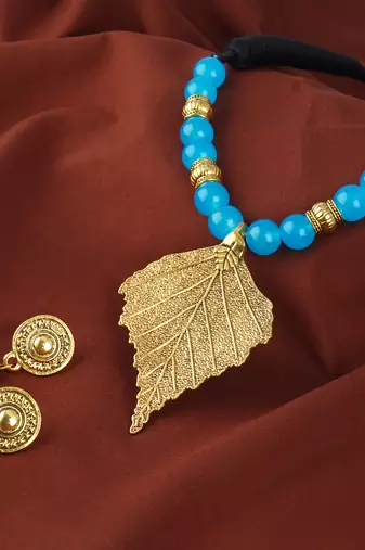 Fashionable gold plated leaf pendant beaded necklaces set with cotton adjustable thread for women and girls.(sky blue