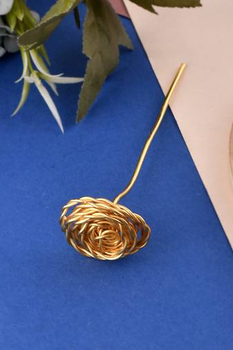 Women gold toned hair stick accessory