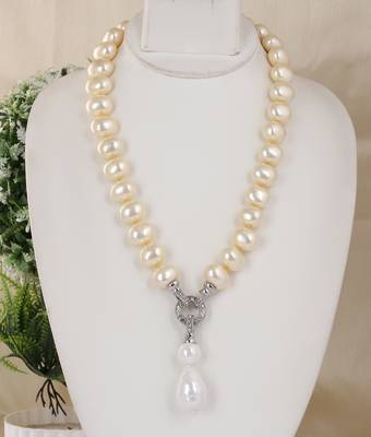 Beautiful egg shape shell pearls necklace set 1