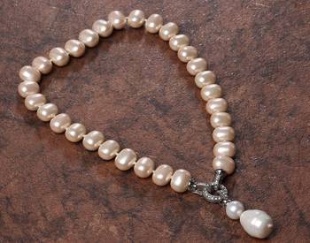 Beautiful egg shape shell pearls necklace set 2