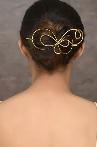 Women gold toned embellished hair accessory