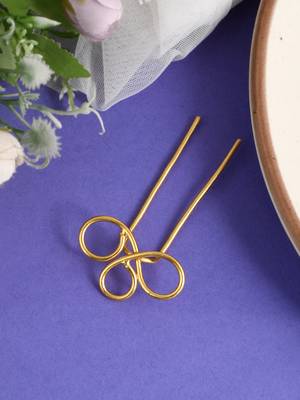 Women gold toned embellished hair accessory 1