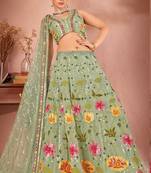 EILARA WOMEN'S GREEN GEORGETTE PREMIUM SEQUANCE AND MULTI THREAD WORK OCCASION WEAR LEHENGA CHOLI
