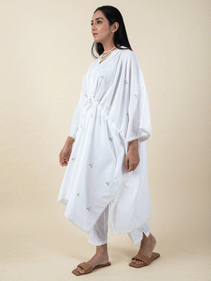 White colorful embroidered kaftan paired with matching pant 2