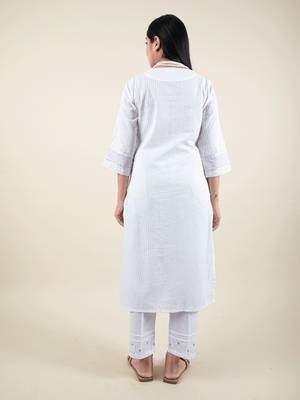 White embroidered cotton kurta paired with matching pant 4