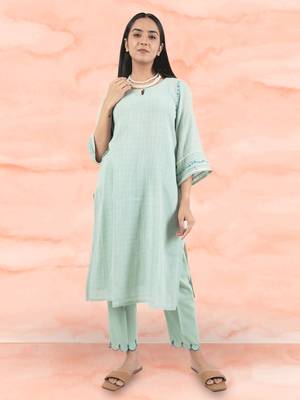 Green hand embroidered cotton kurta paired with matching pant 1