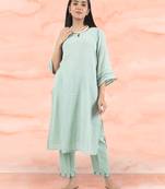 Green hand embroidered cotton kurta paired with matching pant