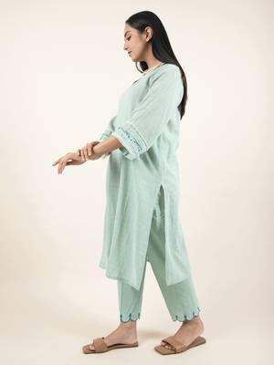 Green hand embroidered cotton kurta paired with matching pant 2
