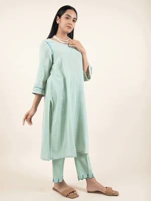 Green hand embroidered cotton kurta paired with matching pant 3