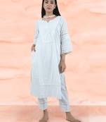 White cotton kurta paired with matching pant