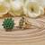 Green Floral Studed Earrings with American Diamonds