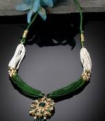 Gold plated pendant necklace with green white beads