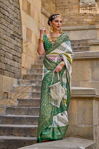 Green color weaving border silk blend saree with blouse