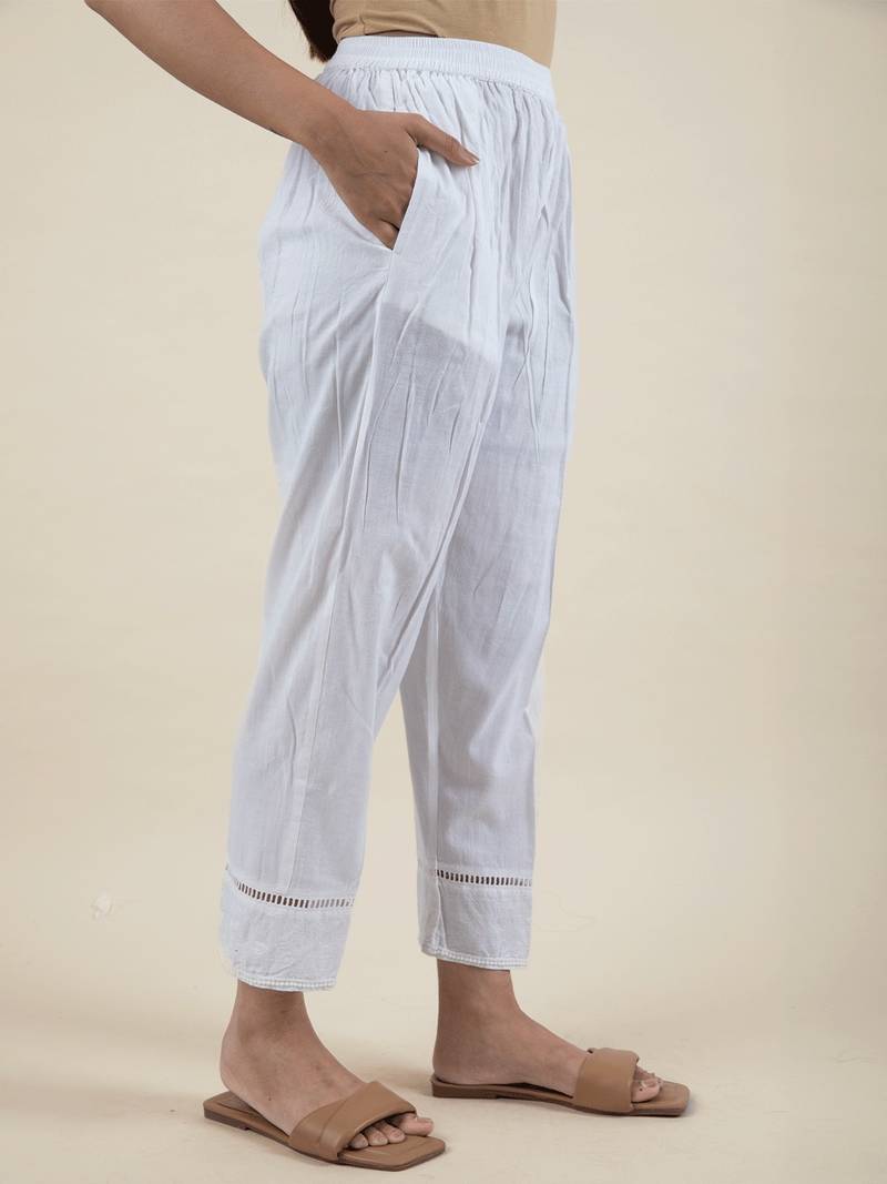 White cotton kurta paired with matching pant