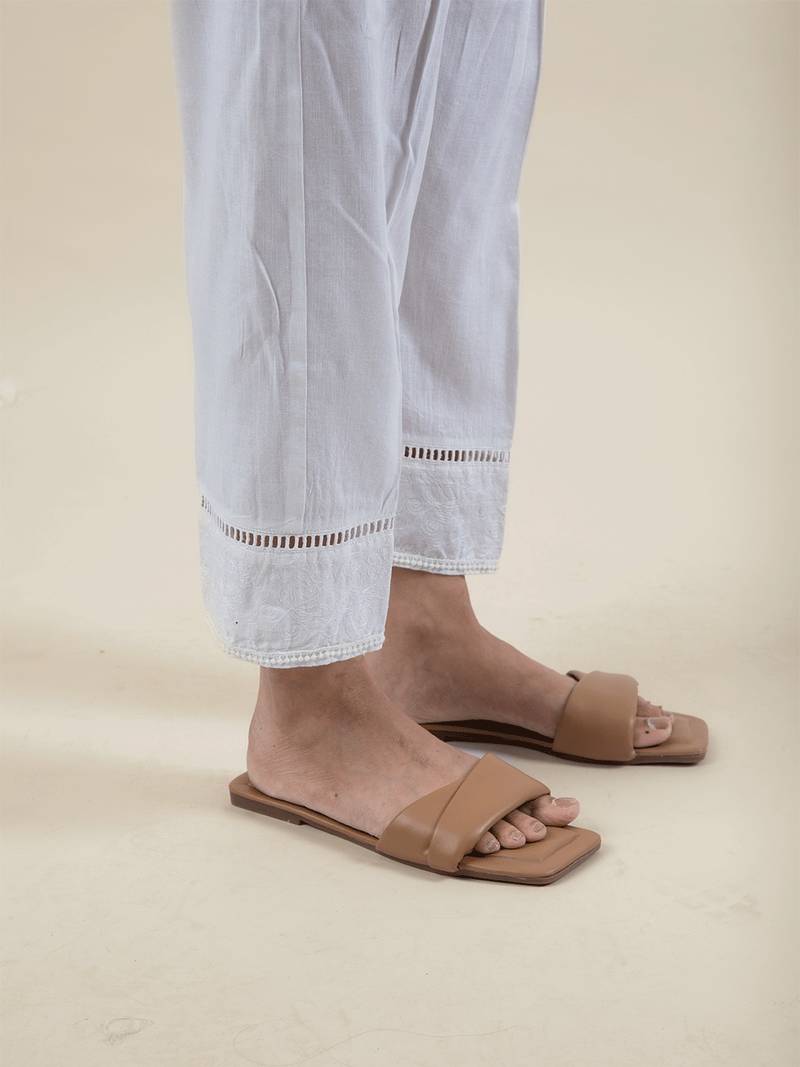 White cotton kurta paired with matching pant
