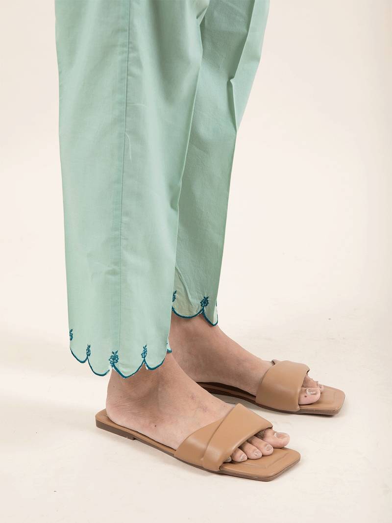 Green hand embroidered cotton kurta paired with matching pant