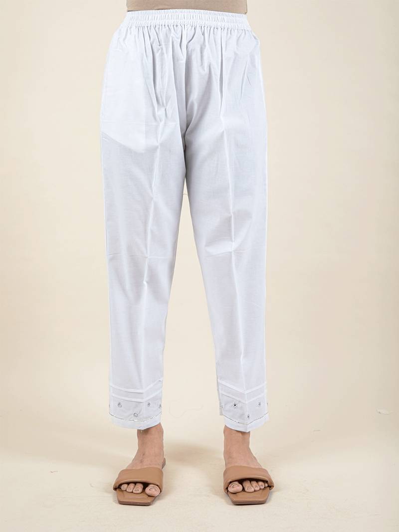 White embroidered cotton kurta paired with matching pant