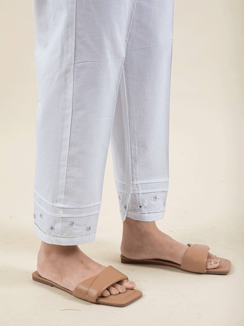 White embroidered cotton kurta paired with matching pant