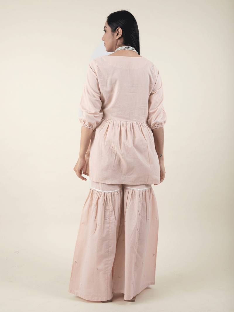 Gajri cotton embroidered peplum paired with matching pant